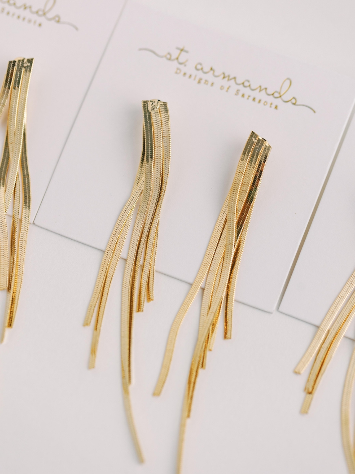 Skinny Gold Cascading Tassel Earrings_St Armands Designs of Sarasota_SAD238